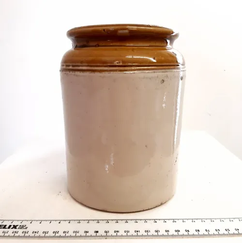 Cream and tan stoneware jar