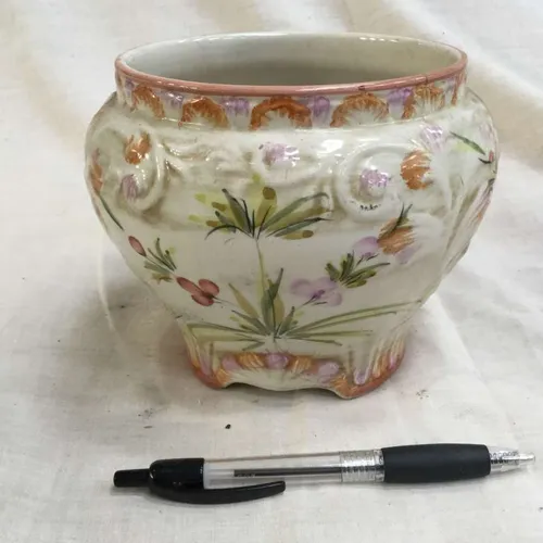 White plant pot with hand painted flower details 