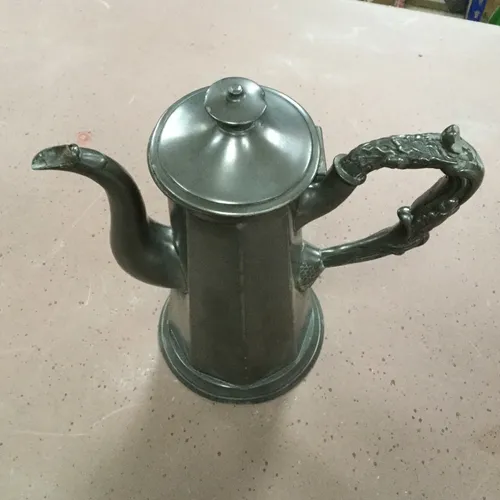 Silver/Pewter Teapot with decorative handle