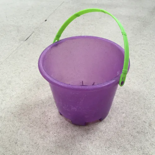 Purple Plastic Bucket with Green Handle