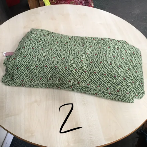 Green drapes/curtain with circles and diamonds pattern 