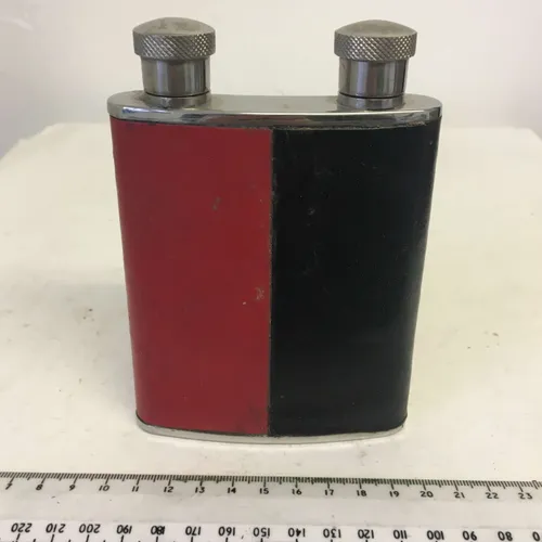 Double hip flask with red and black leather cover