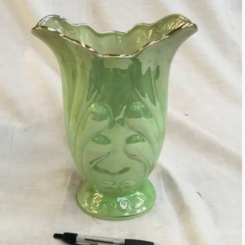 Pale green glazed vase with gold trim