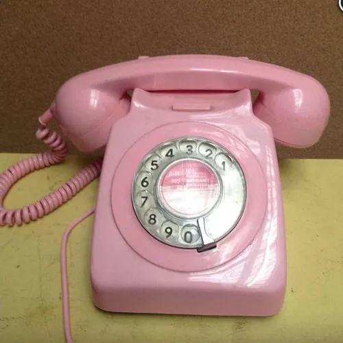 pink GPO corded rotary dial telephone