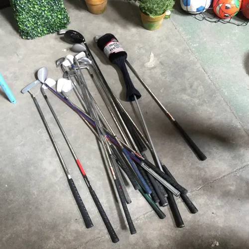 Quantity of Assorted Golf Clubs
