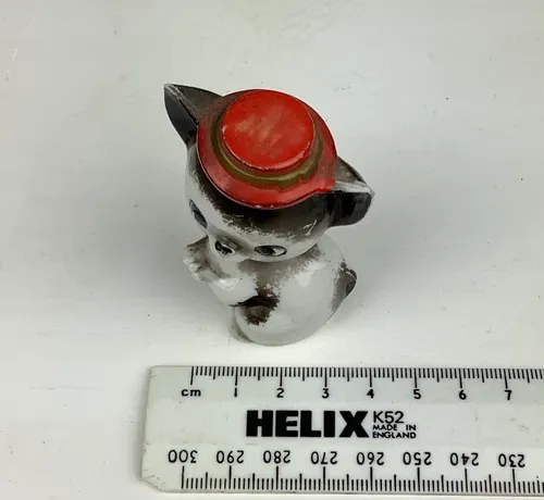 Black and White Ceramic Cat with Red Hat