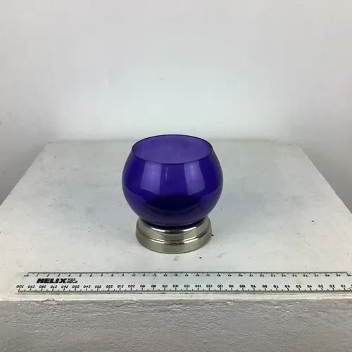 Small blue glass bowl with silver base/stand