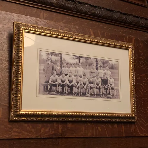 Black and White Football Team Photo in Gold Frame