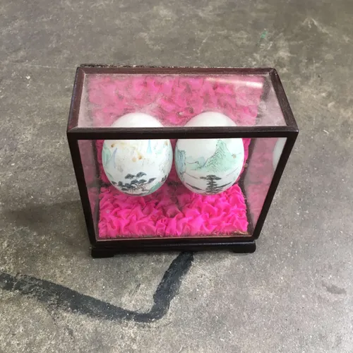 Japanese Style Painted Eggs In Display Case