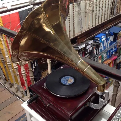 replica gramophone with dark wood and gold horn