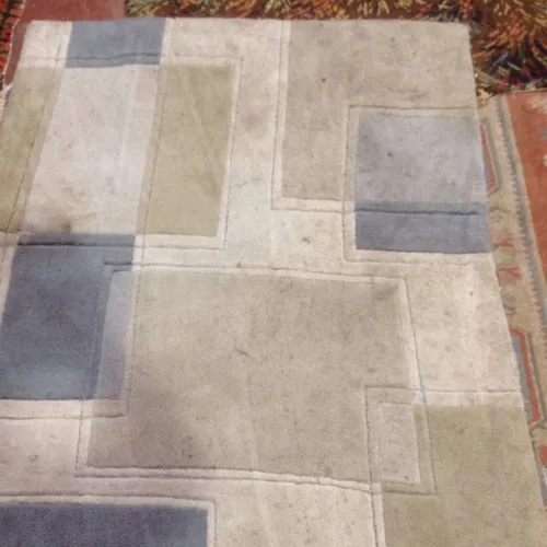 Area Rug with Varying Size Squares in Blue/Cream/Tan Design