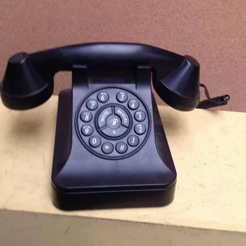 black corded push button telephone