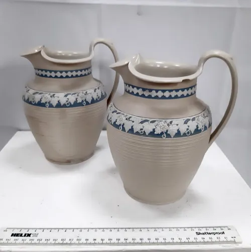Pair of early 19th century feldspathic stoneware jugs (circa 1810)