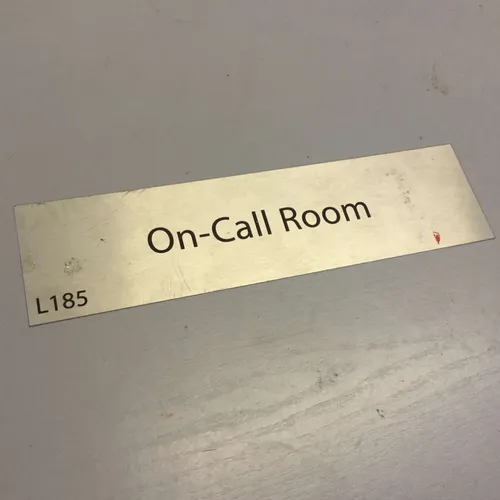 Metal On-Call Room Sign