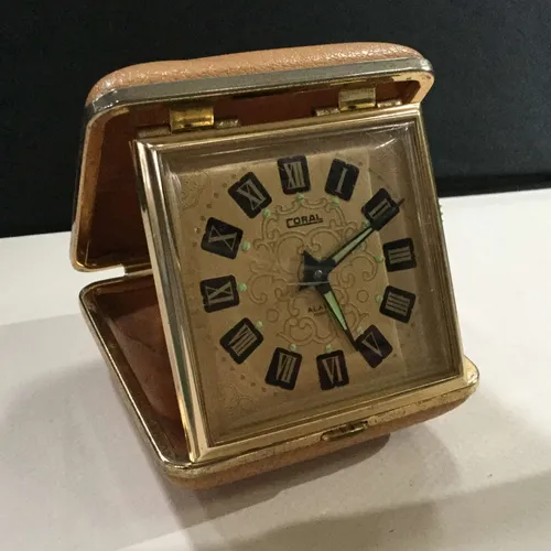 Small coral clock with case