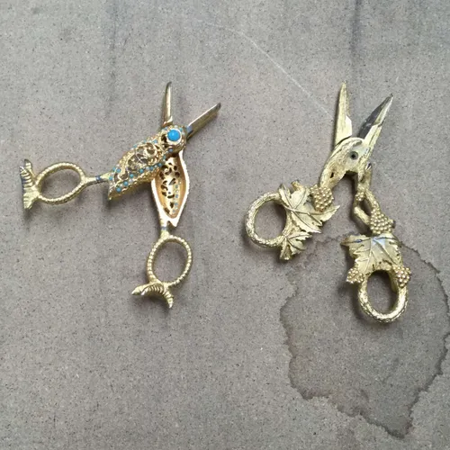 Small gold decorative scissors