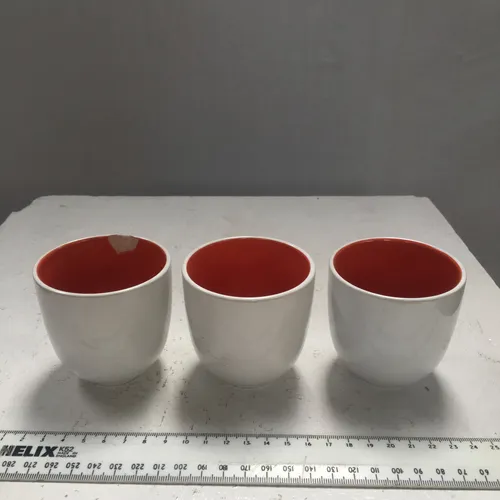 White and Red Ceramic Egg Cups