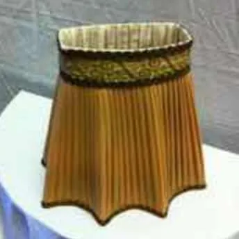Period lampshade with pleated fabric and ornate trimimg