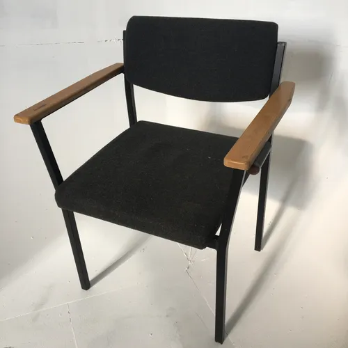 Period stacking office chair with cushioned seat and backrest, metal frame and wooden arm rests