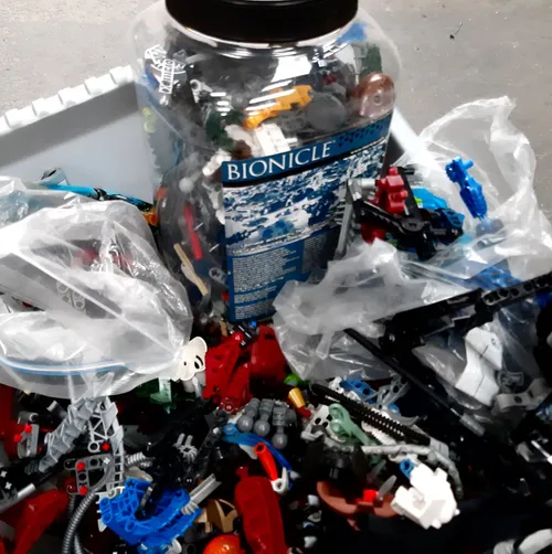 Box of Bionicle toys and pieces