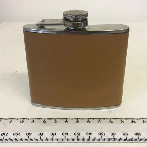 Small hip flask with brown/tan leather cover
