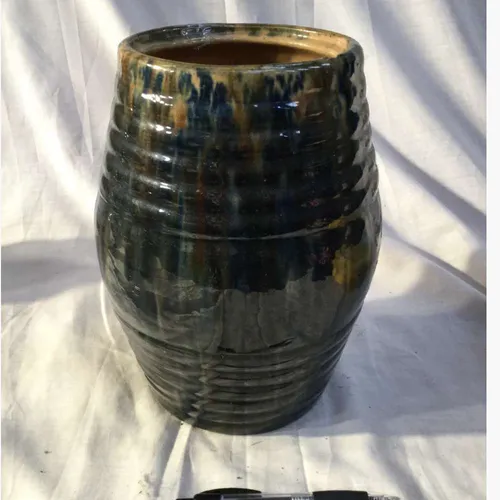 Dark blue ridged ceramic vase
