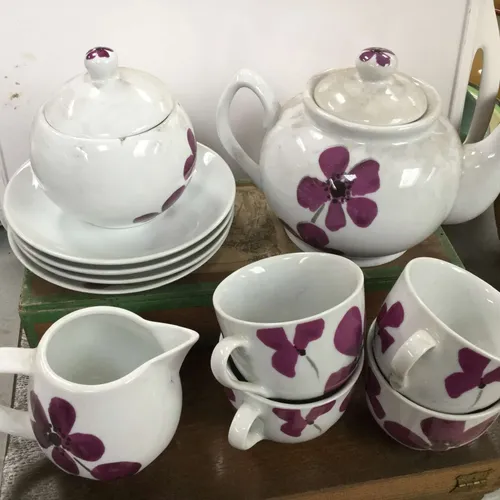 White tea set with purple flowers