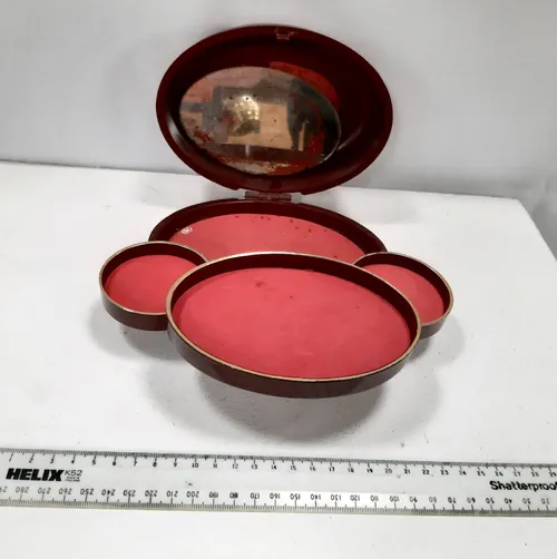 Red/Burgundy plastic jewellery box with gold design 