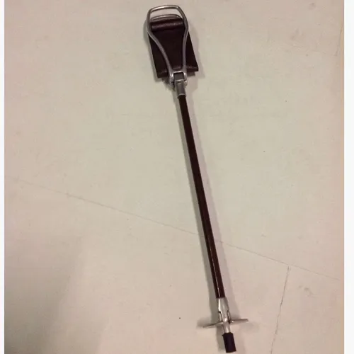 stick seat with brown leather strap