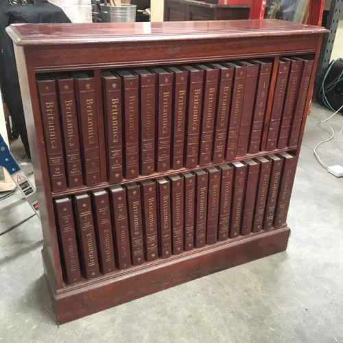 Shelf with 34 Period Britannica Encyclopedia