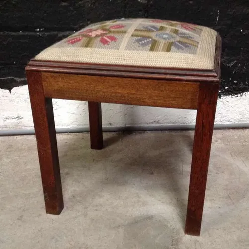 wood foot stool with embroidered cushion