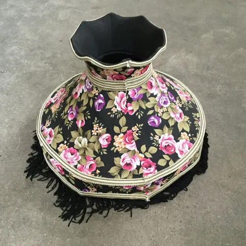 Black and floral lampshade with black tassels