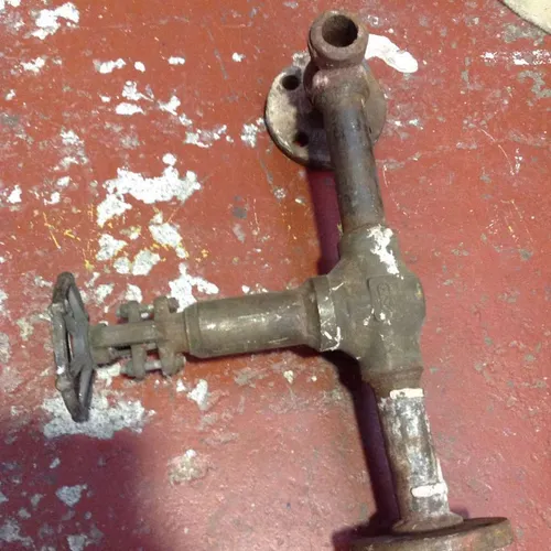 rusty pipe and valve wheel