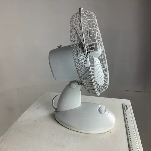 White plastic desk fan 