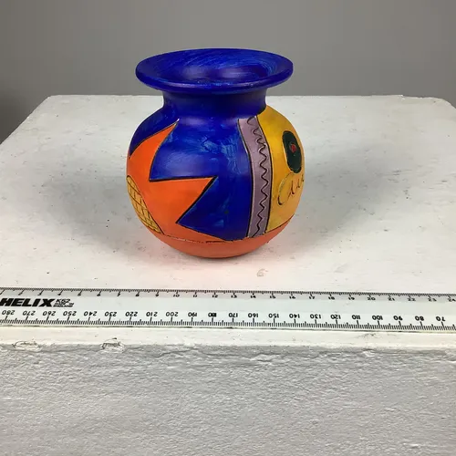 Small blue hand painted pot with sun