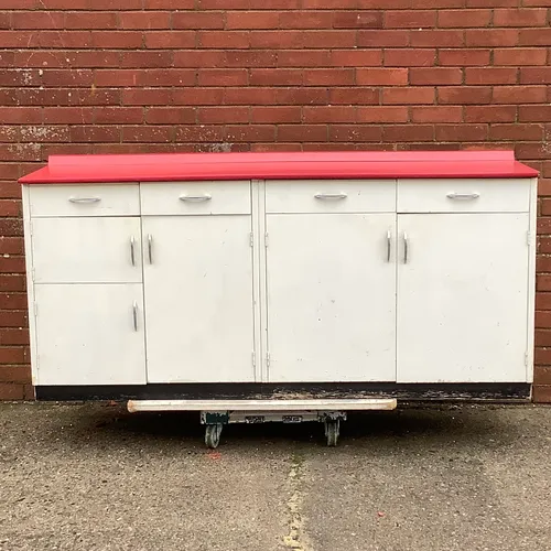 White Kitchen Cupboards/Unit with Red Countertop 