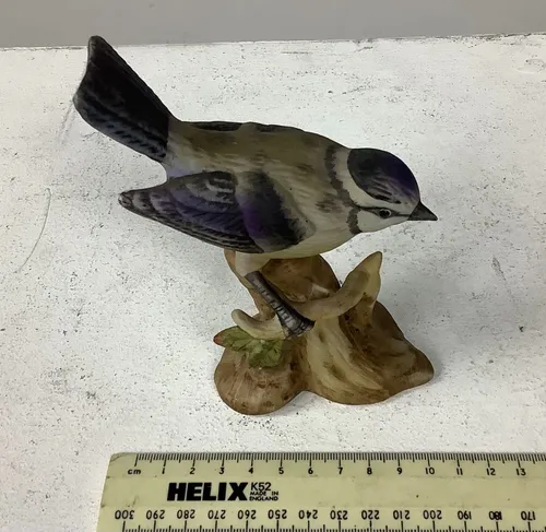 Ceramic Bird Ornament on Branch