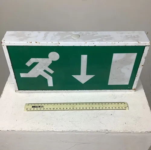 White and Green Exit Sign