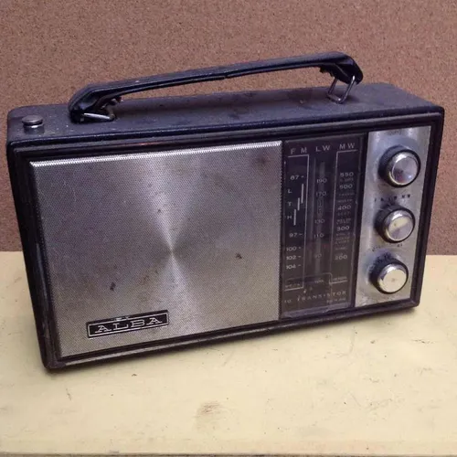 Period Alba small transistor radio with handle, black with silver detail