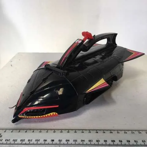 Children's black spaceship/rocket toy