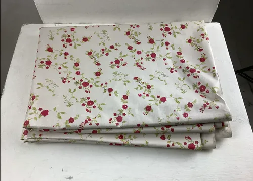 With fabric with red flowers 