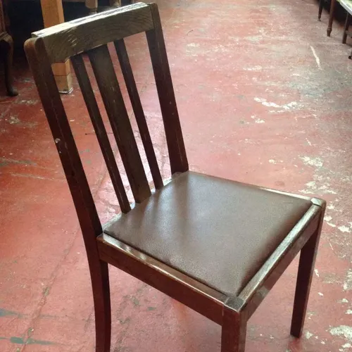 wood Queen Anne dining chair with brown leather seat
