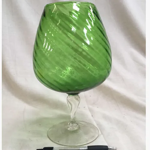 Green glass wine glass with clear stem