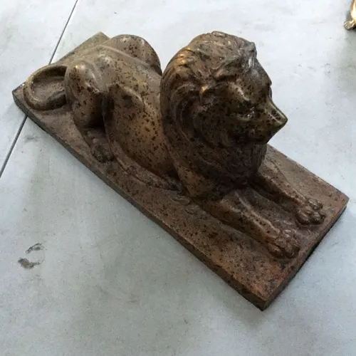 Heavy gold lion ornament