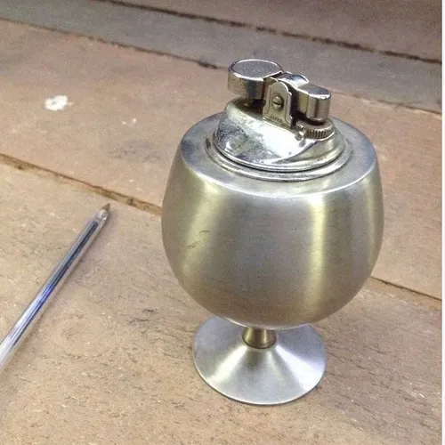 silver table top lighter metal