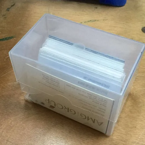 Clear plastic business card case with cards