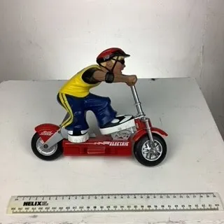 Boy on Electric Scooter Toy