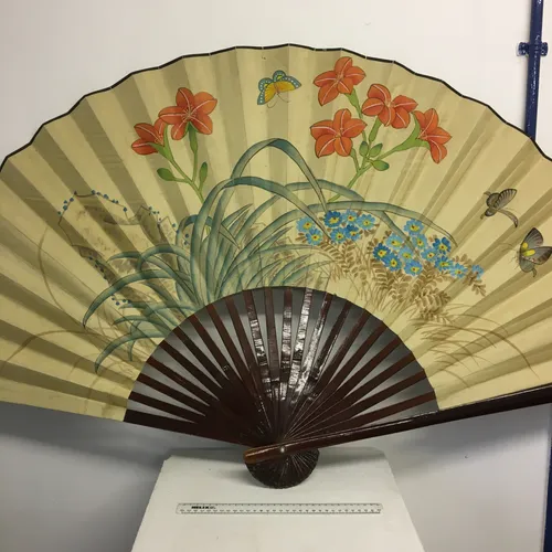 Dark wood oriental folding hand fan 