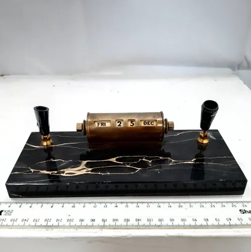 Marble pen holder with perpetual calendar