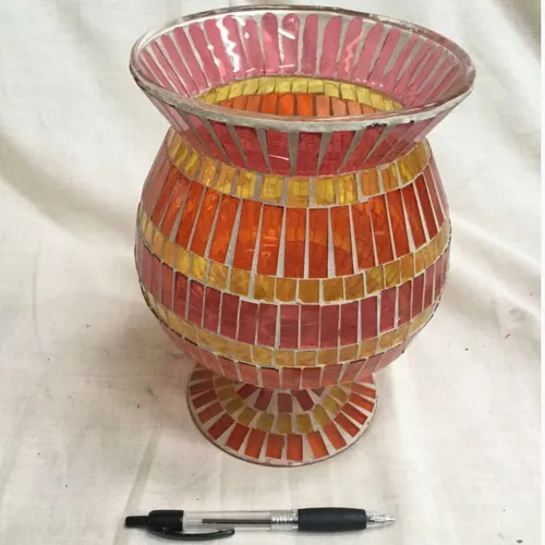 Glass vase with orange, red and yellow mosaic tiles